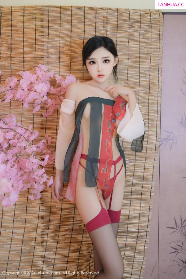   [XiuRen]高清写真图 2024.10.28 No.9351 妙可可Cheese 黑丝美腿第53张图片